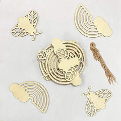 Set of decorative wooden cutouts with butterfly and rainbow designs on a light gray background.