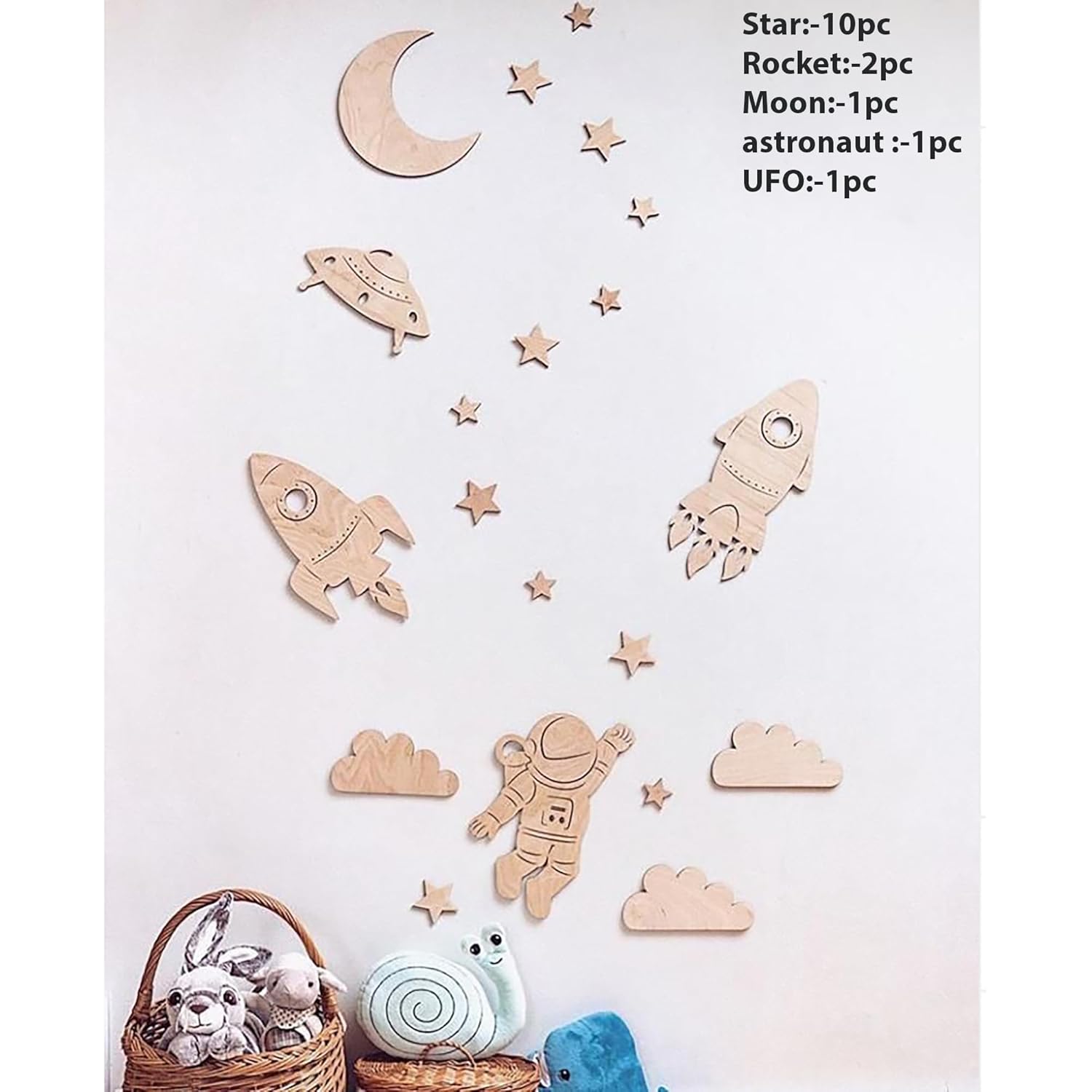 Wooden space-themed wall stickers including stars, rockets, a moon, an astronaut, and a UFO on a white background.