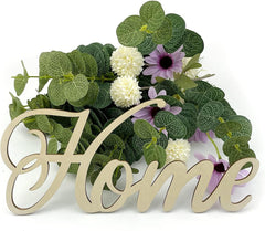 Decorative sign with 'Home' and floral elements on a white background