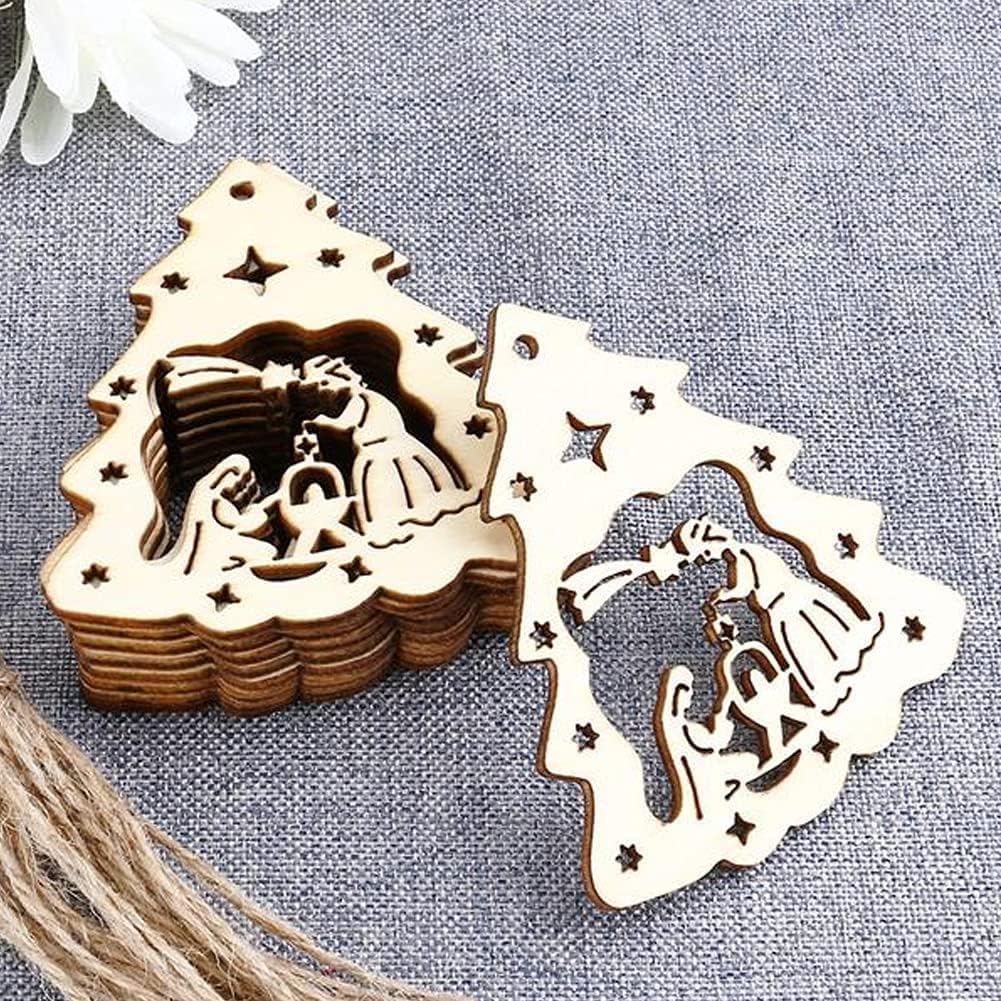 Wooden nativity scene cutouts on a textured surface with white flowers.