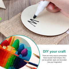Hand holding a marker over a wooden heart shape with a colorful paint swatch and text promoting DIY craft ideas.