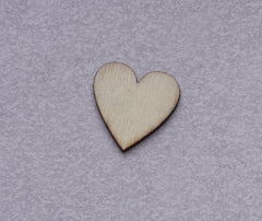 Wooden heart shape on a gray background