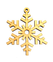 Gold snowflake-shaped ornament on a white background