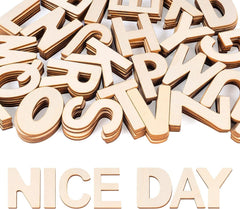 Wooden letters spelling 'NICE DAY' on a white background