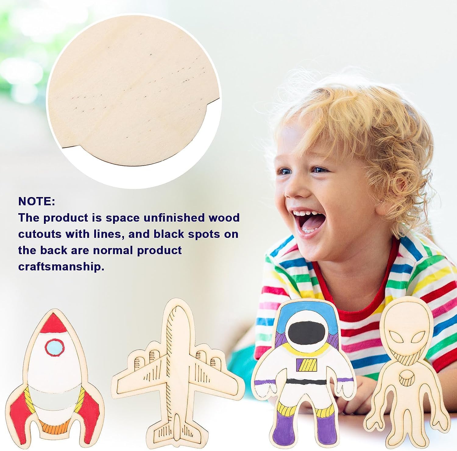 Child playing with space-themed wooden cutouts including a rocket, airplane, astronaut, and alien.