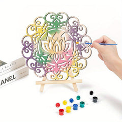 Colorful mandala art set with a hand holding a paintbrush and a small easel on a white background.
