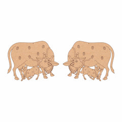Wooden cutout of a bull and calf design on a white background