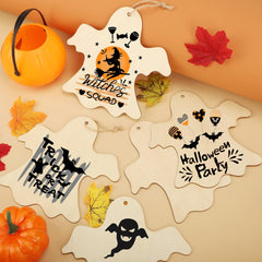 Halloween-themed wooden tags with decorative designs on a beige background with pumpkins and leaves.