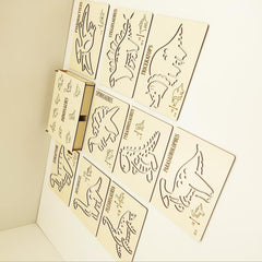 Set of dinosaur-themed cards with illustrations on a beige background