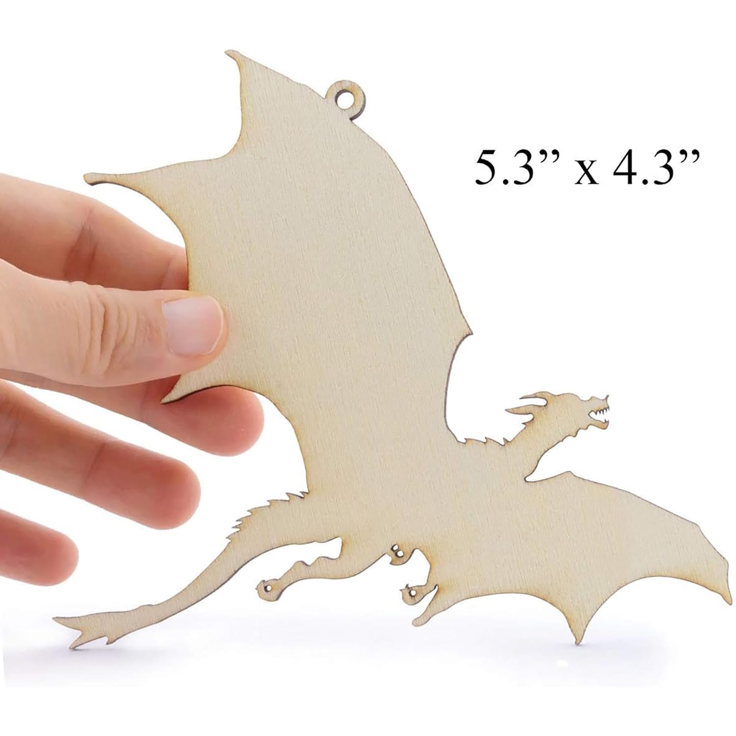Wooden dragon-shaped ornament held by a hand with dimensions displayed.