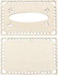 Two beige metal dies with butterfly and heart cutouts on a white background