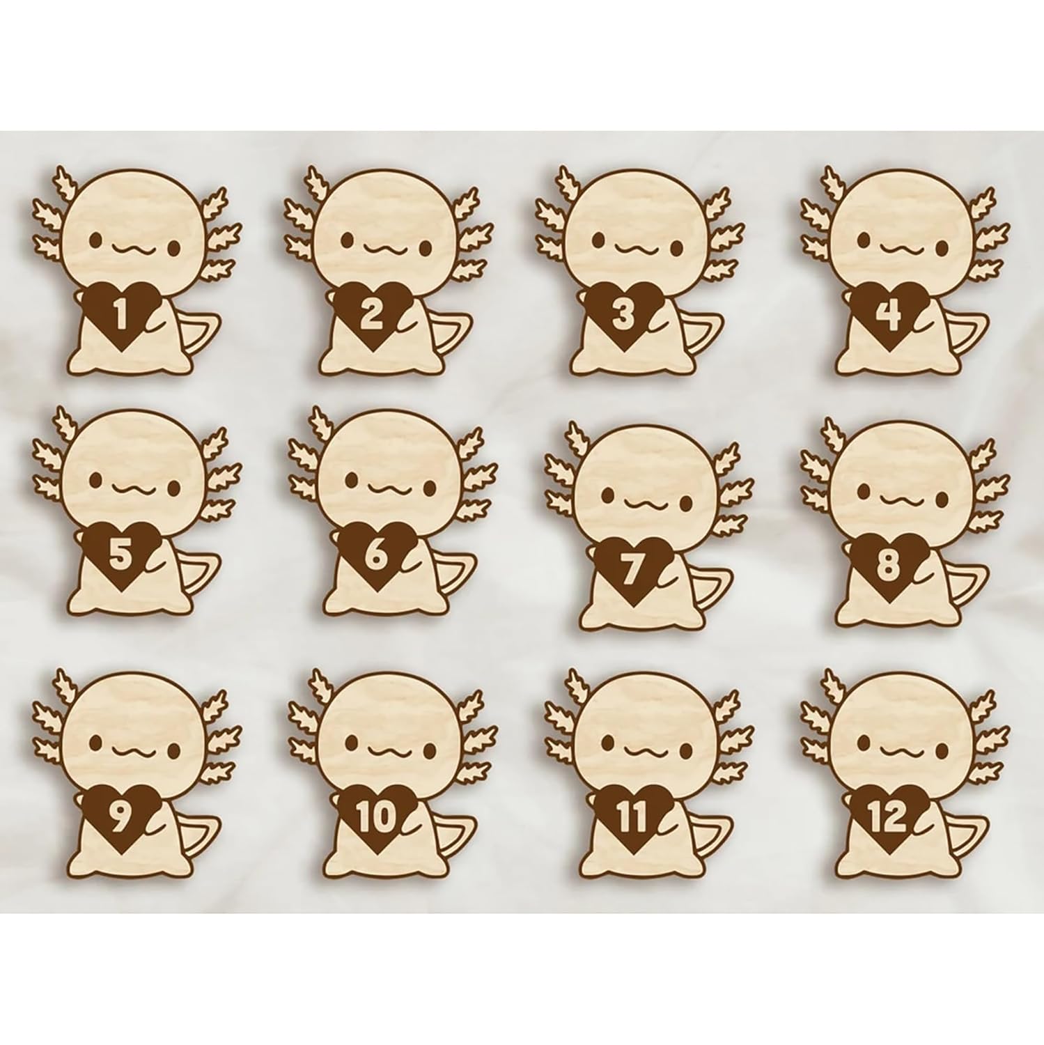 Set of wooden angel figures with heart-shaped numbers on a white background