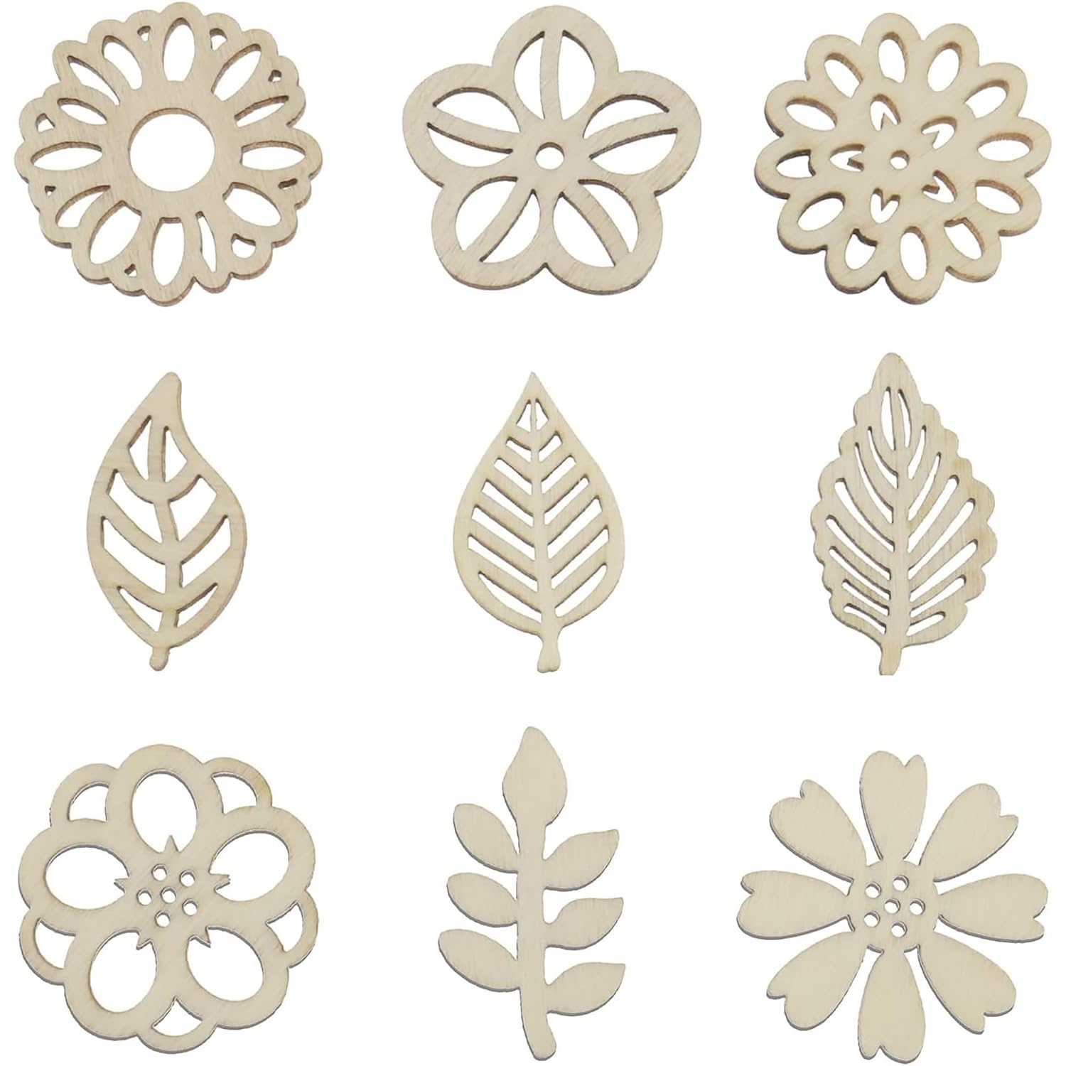 Set of floral and leaf-shaped cutouts on a white background