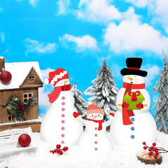 Three snowmen with festive accessories in a snowy landscape with a clear blue sky.