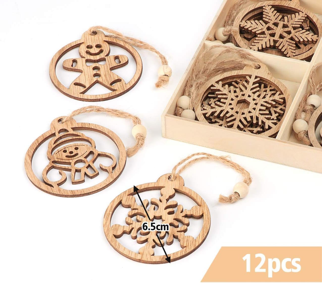 Wooden Christmas ornaments with snowflakes and gingerbread men in a box on a white background