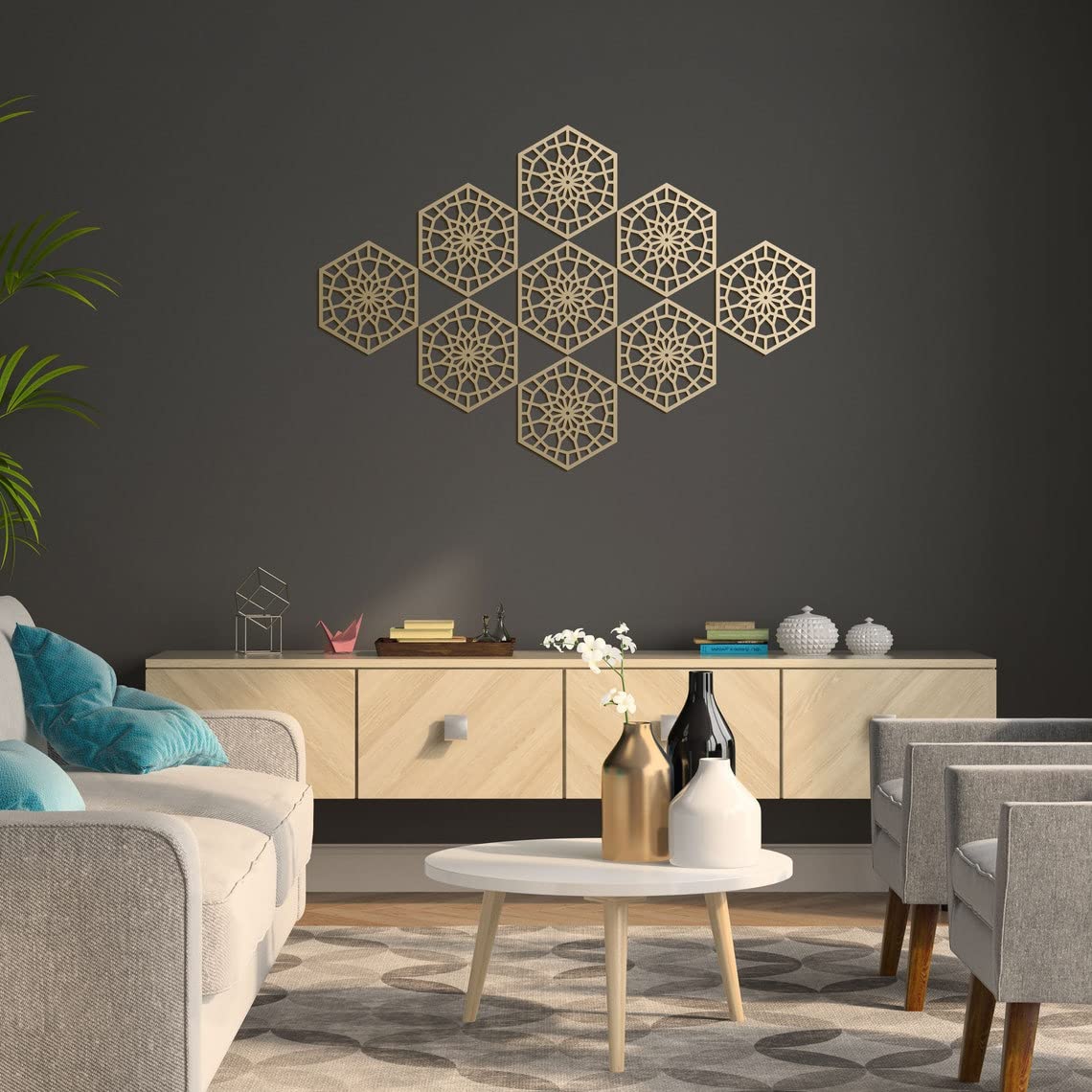 Living room with geometric wall art, furniture, and decor items.