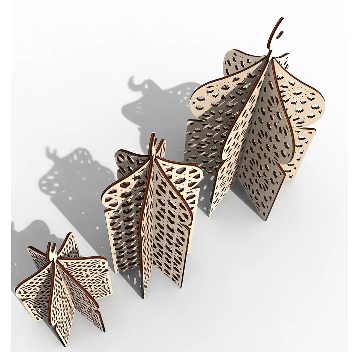 Decorative leaf-shaped objects with intricate patterns on a white background