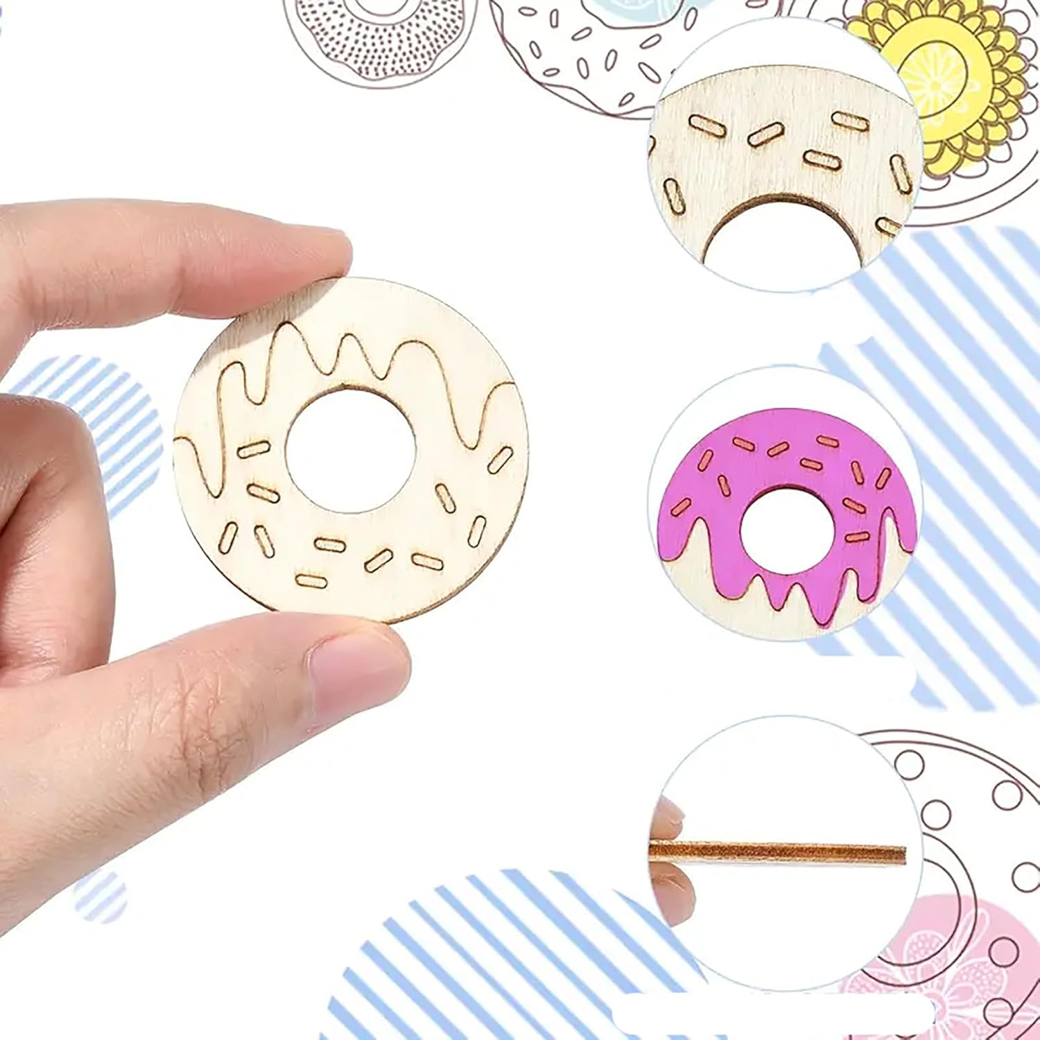 Wooden donut-shaped cutouts with decorative elements, held by a hand against a colorful background.