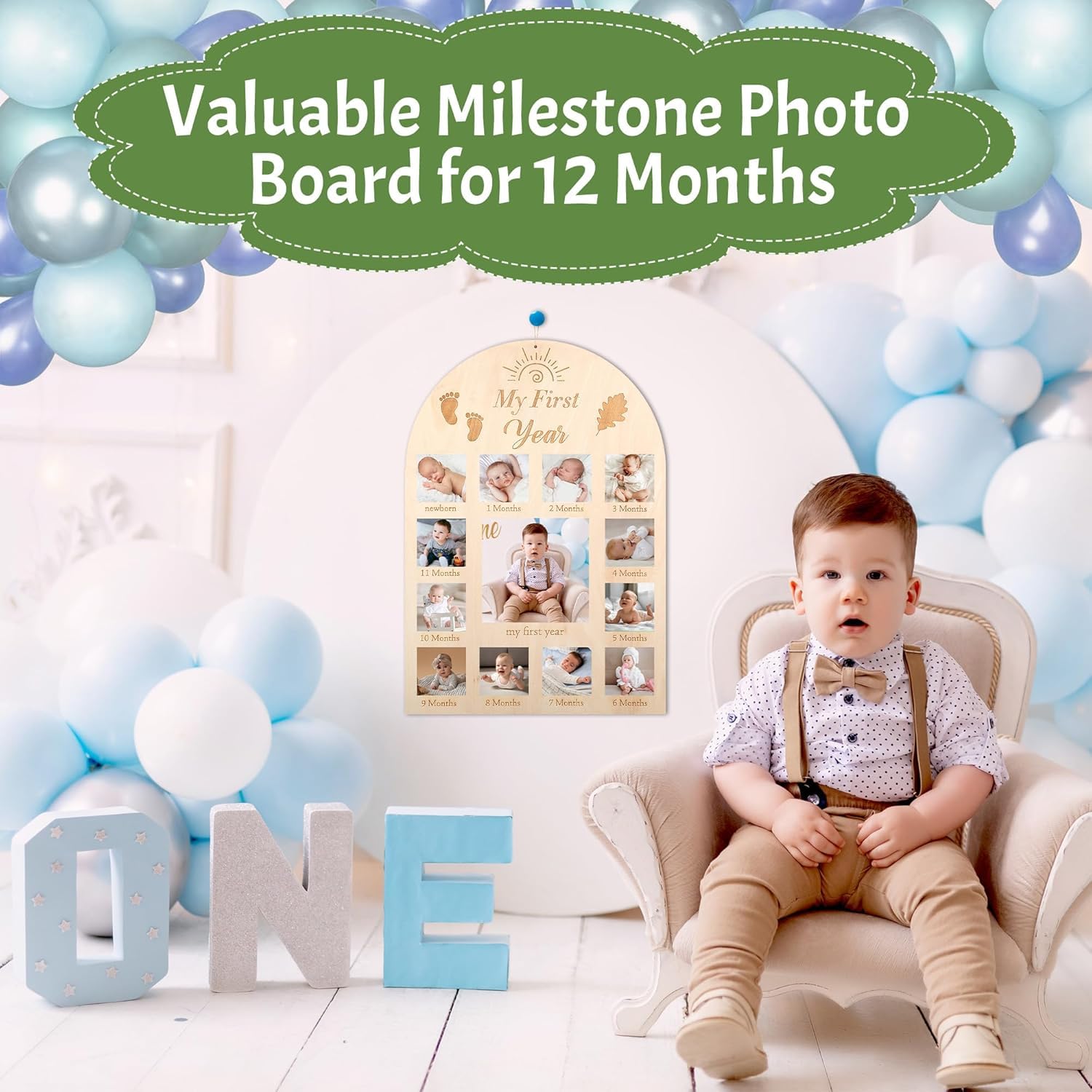 Baby milestone photo board with balloons and a child in formal attire.