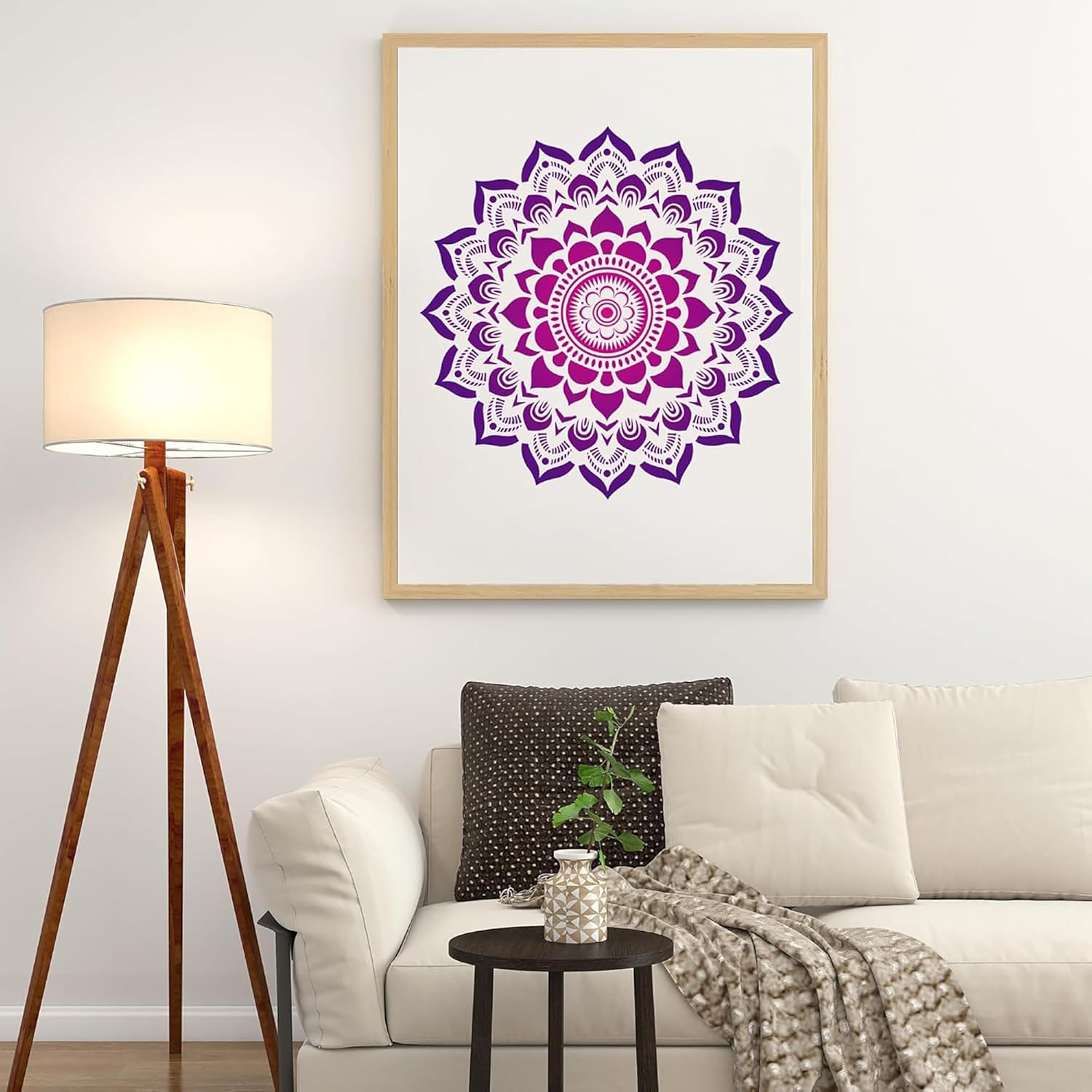 Living room with a mandala art print on the wall, a lamp, and a couch.