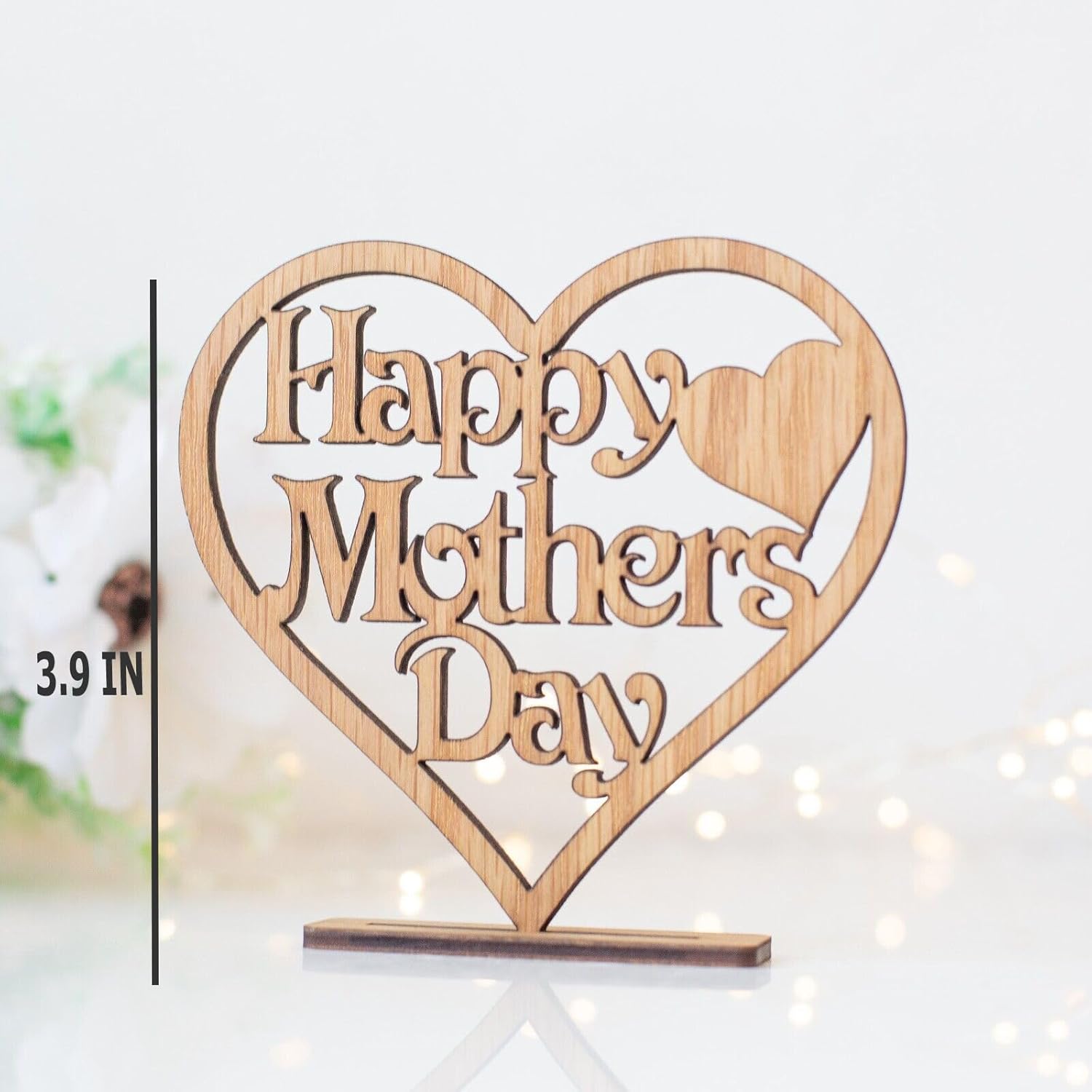 Wooden heart-shaped sign with 'Happy Mother's Day' text on a white background