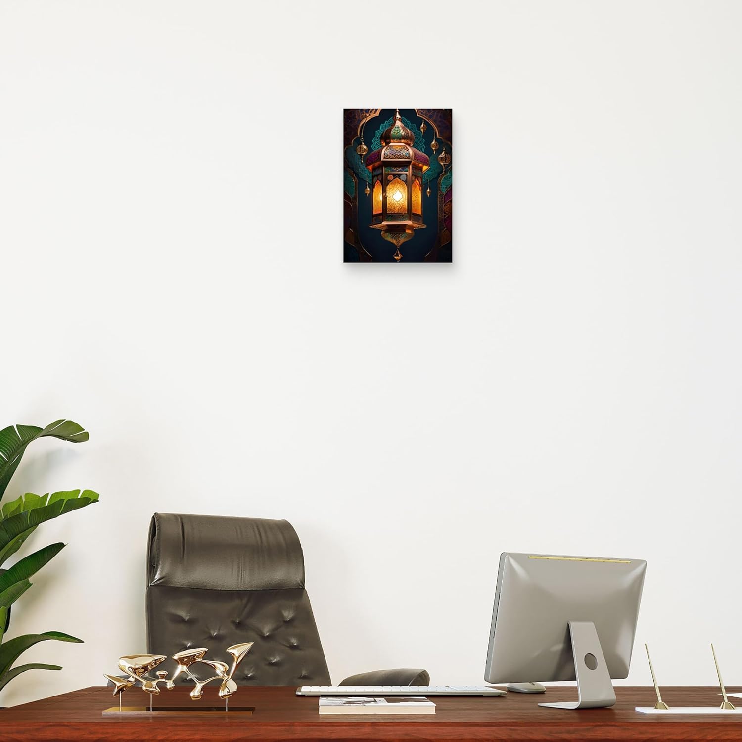 Modern office setup with a chair, computer monitor, and decorative items on a desk.