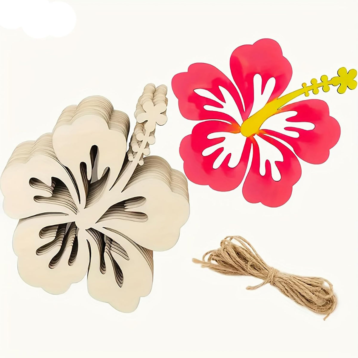Wooden flower-shaped cookie cutter with a pink floral decoration and jute string on a white background