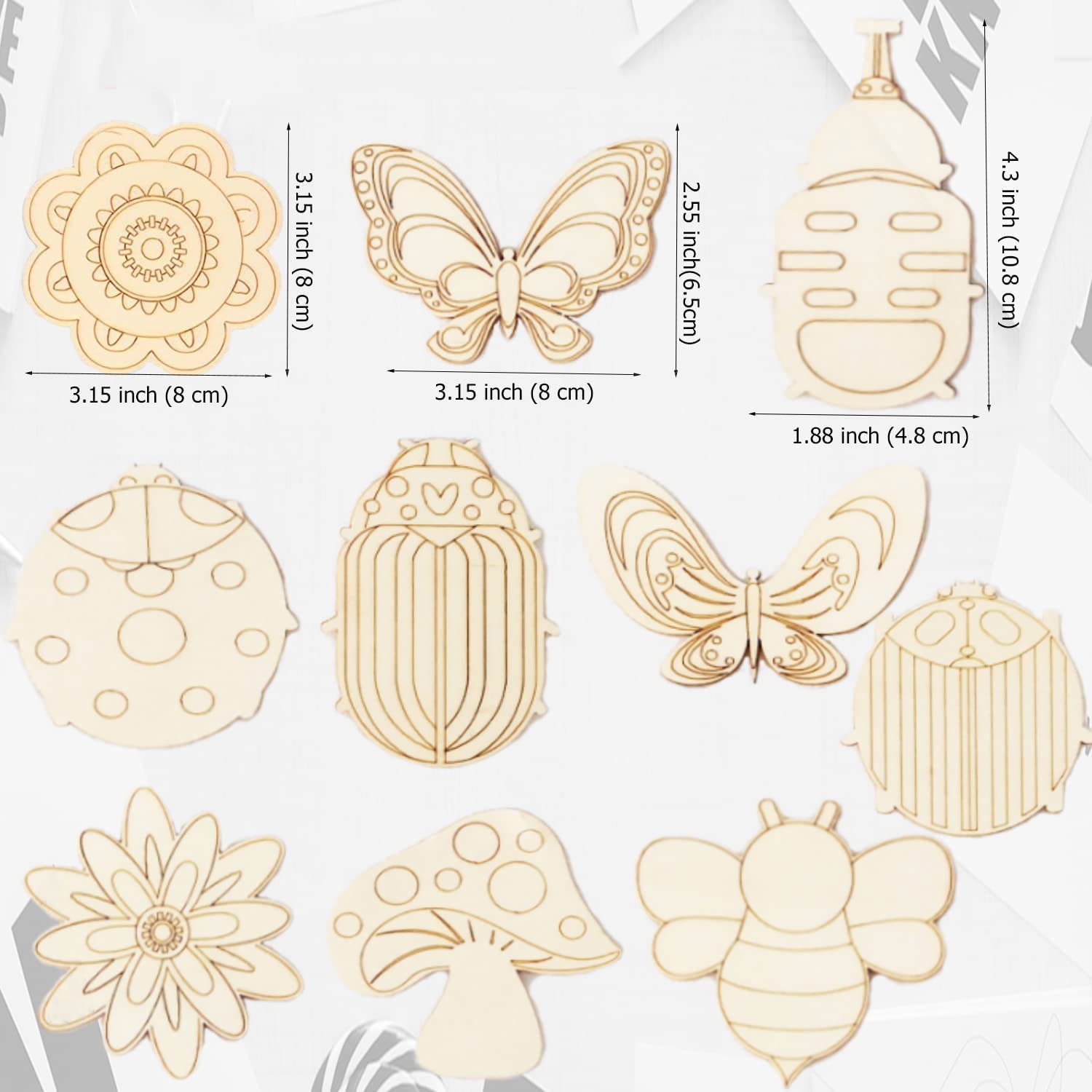 Set of wooden cutouts with butterfly, beetle, flower, and mushroom shapes, each with dimensions displayed.