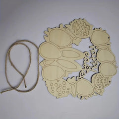 Decorative wreath cutout with string on a white background