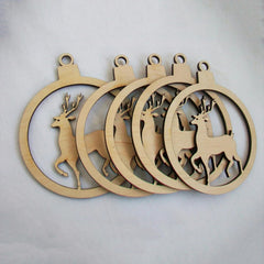 Set of wooden Christmas ornaments with deer designs on a light gray background