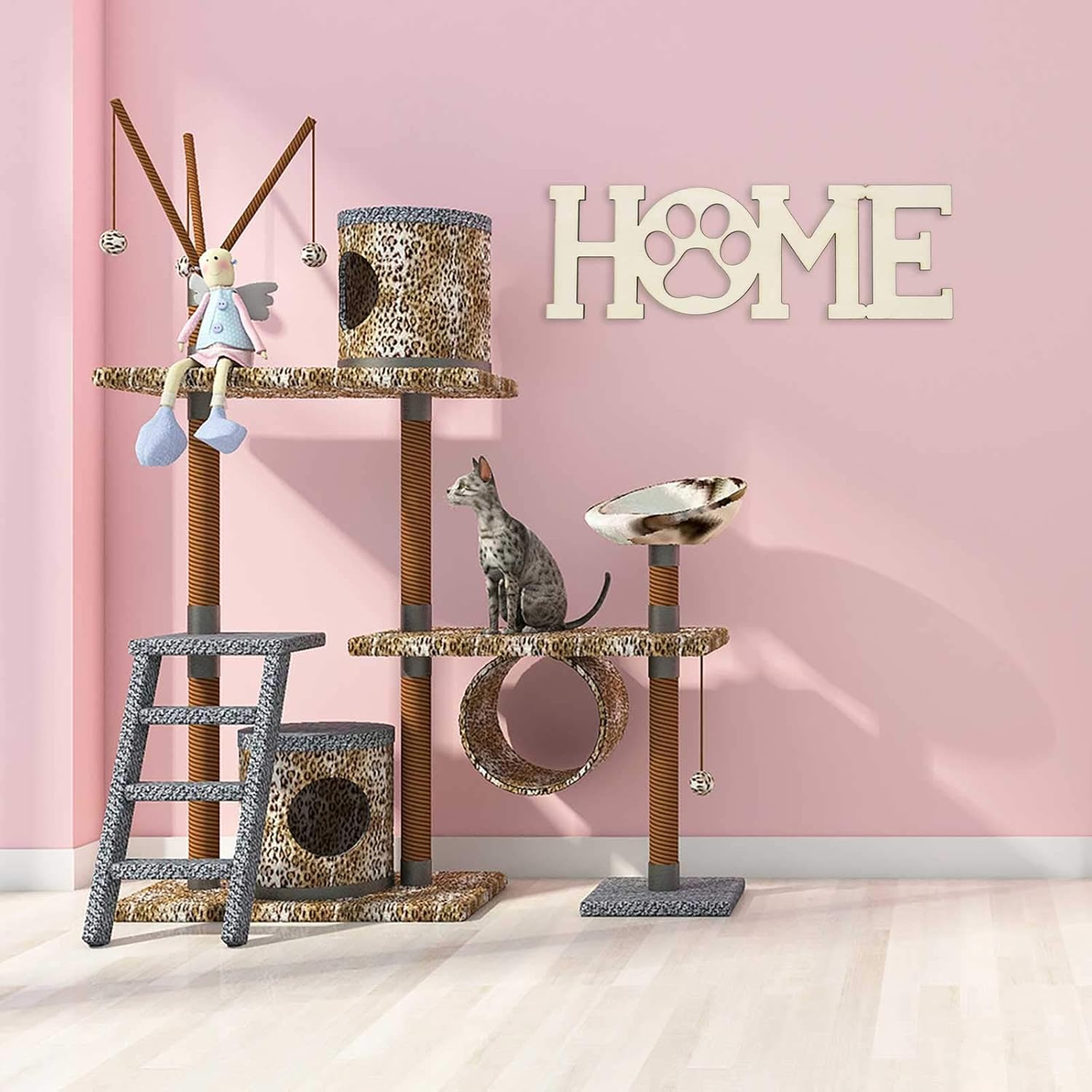 Cat tree with various perches and toys against a pink wall with 'HOME' decor.