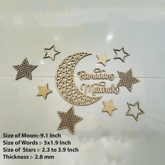 Decorative wooden cutout with 'Ramadan Mubarak' text, stars, and a moon on a white background.
