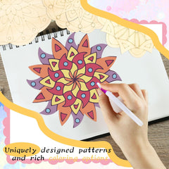 Coloring book with a mandala design and a hand holding a coloring pen.