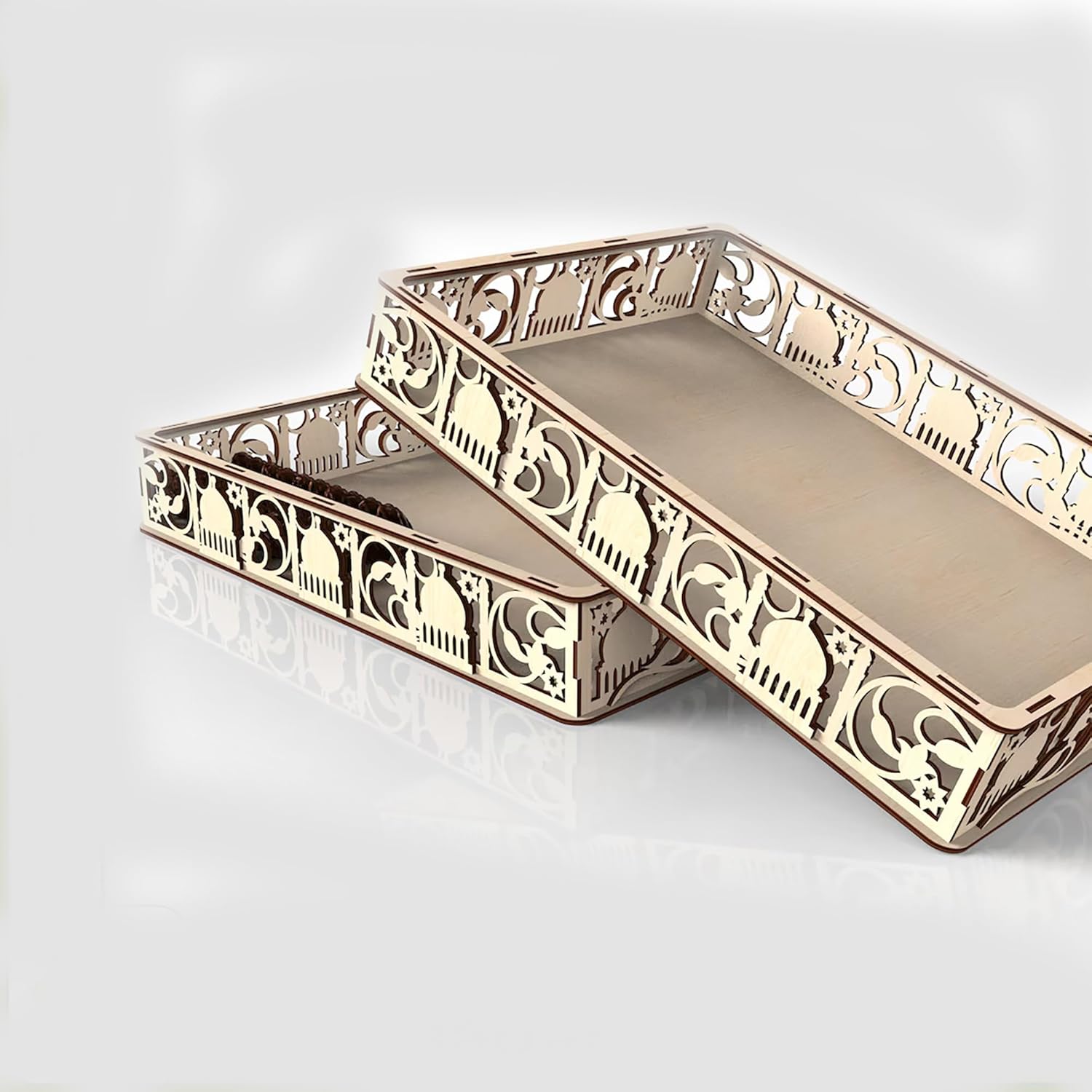 Decorative gold tray with intricate patterns on a white background