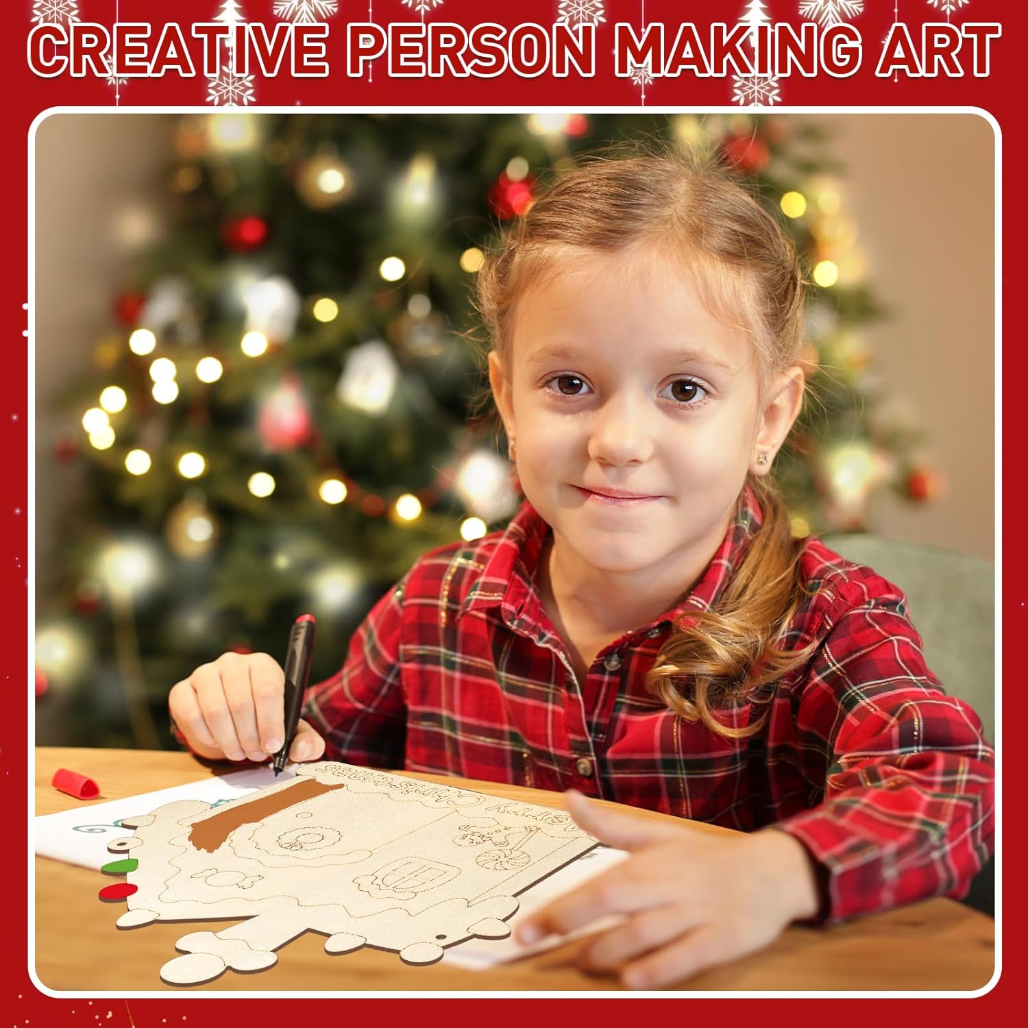Child in a red plaid shirt coloring a picture of a reindeer in front of a decorated Christmas tree.
