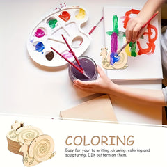 Person coloring on a wooden board with paint and brushes, surrounded by art supplies.