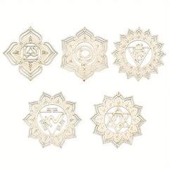 Set of five white mandala designs with symbols on a white background