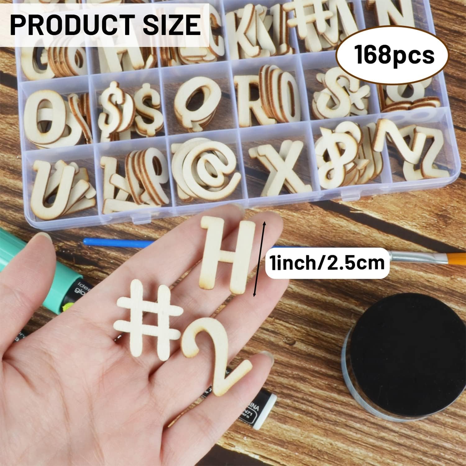 Set of wooden letters and numbers in a clear container with a hand holding a letter 'H'.