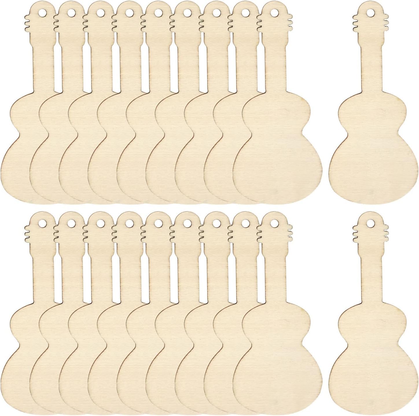 Set of wooden guitar-shaped cutouts on a white background