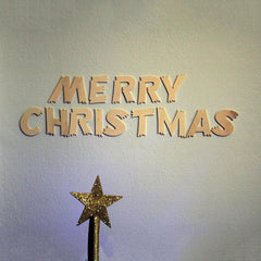 Gold 'Merry Christmas' text on a light gray background with a gold star.