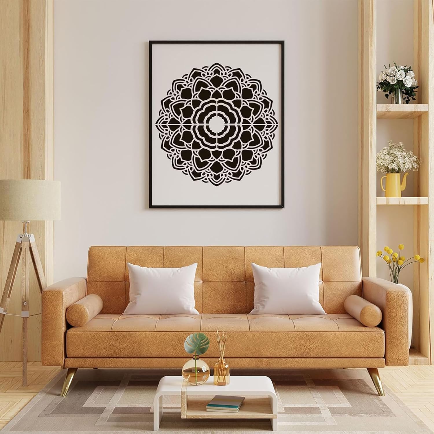 Living room with a tan sofa, coffee table, and decorative wall art.