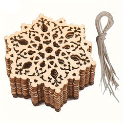 Stack of wooden coasters with intricate cut-out designs and a string on a white background