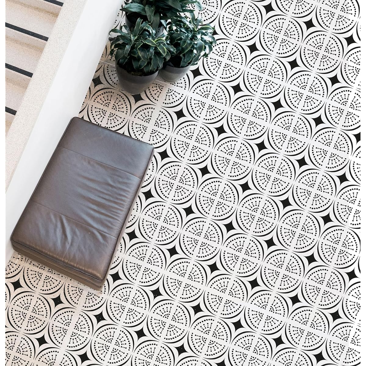 Patterned floor with a plant and cushion