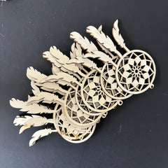 Wooden dreamcatcher ornament on a black background