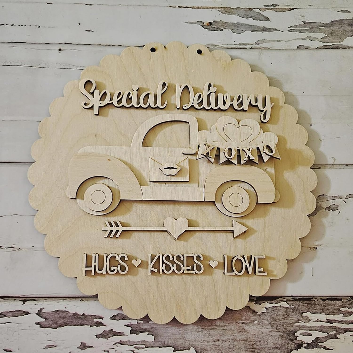 Wooden wall decor with a truck design and text on a rustic wooden background