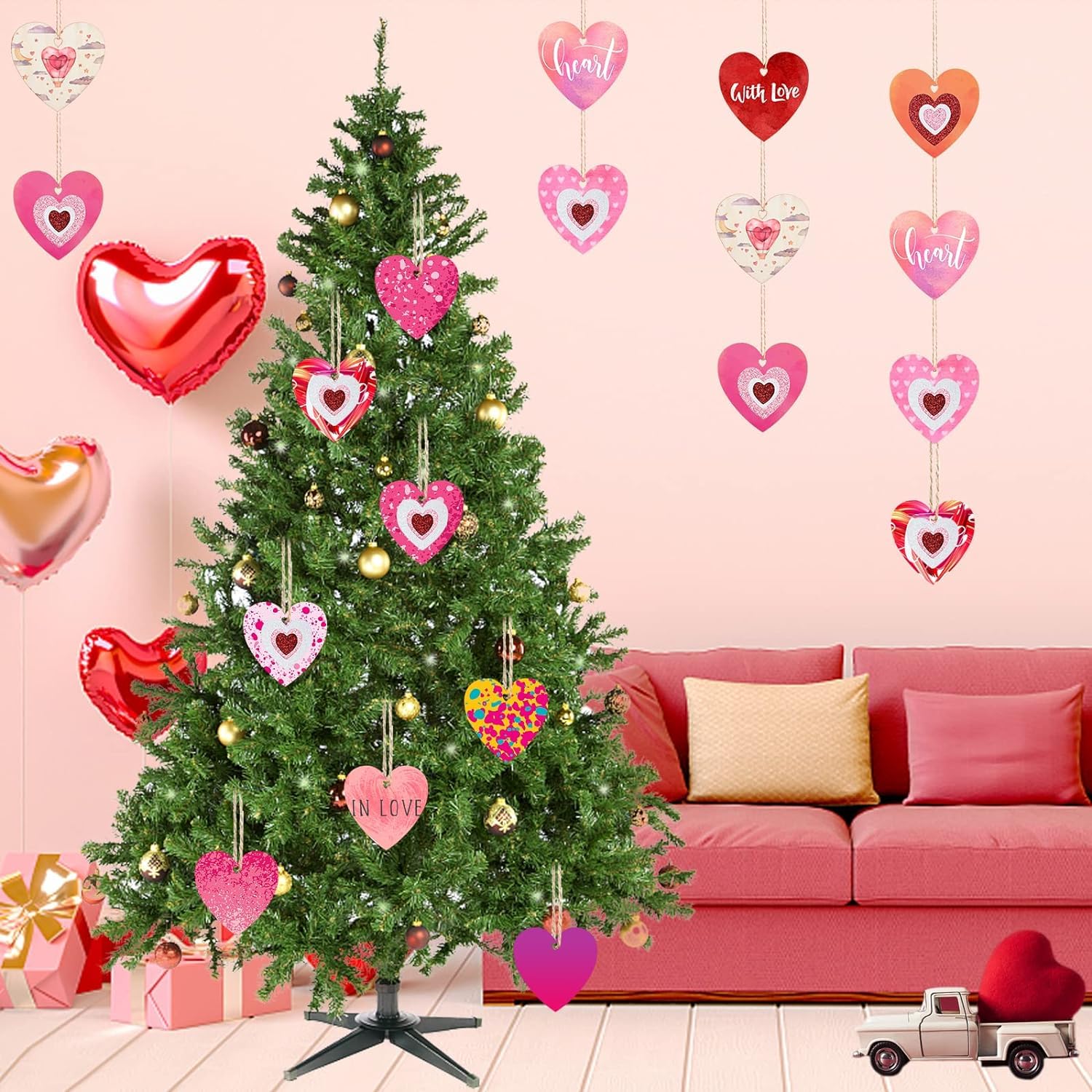 Decorated Christmas tree with heart-shaped ornaments in a living room setting.
