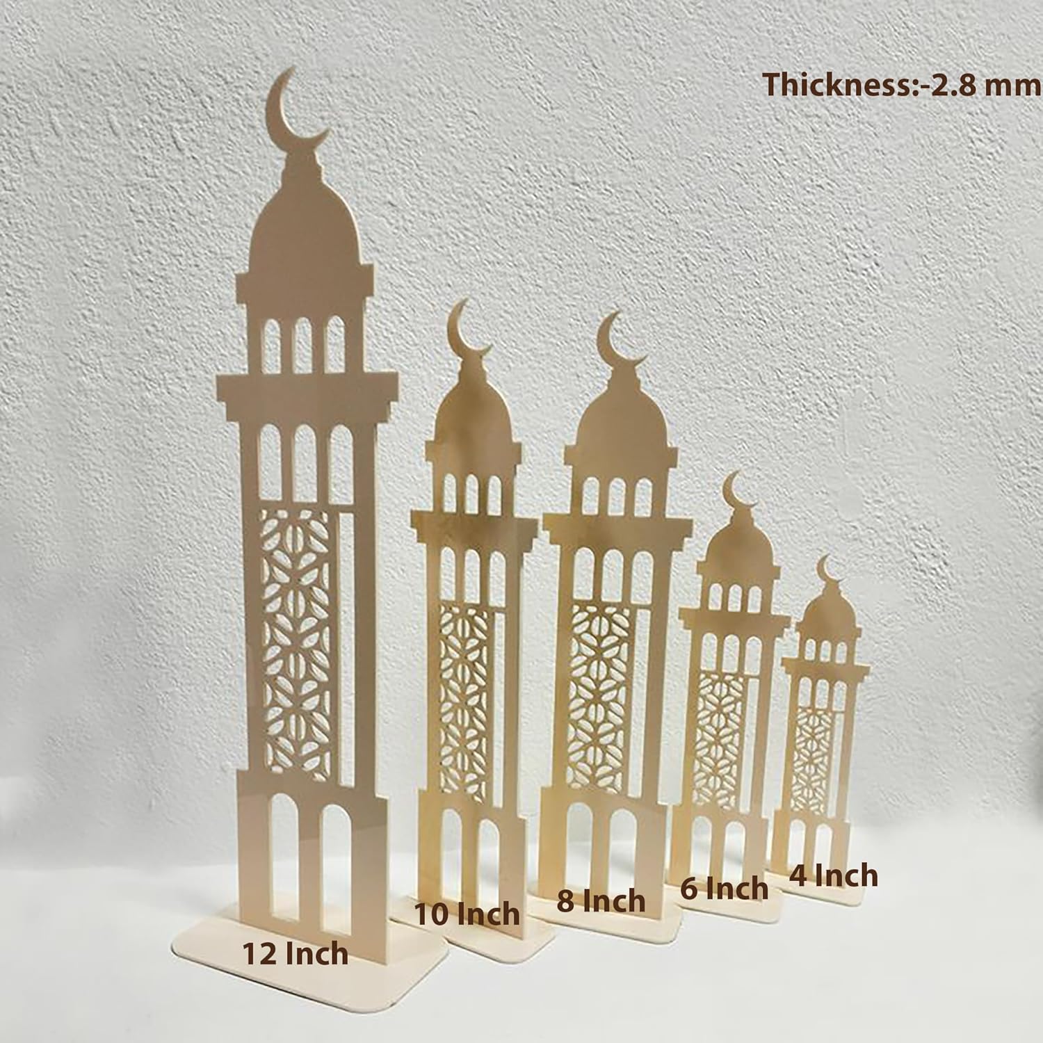 Set of four decorative towers with varying heights on a white background