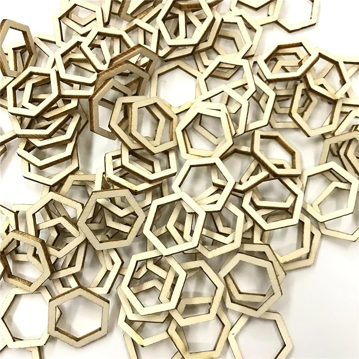 Collection of wooden hexagonal shapes on a white background