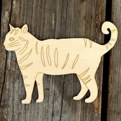 Wooden cat-shaped cutout on a wooden surface