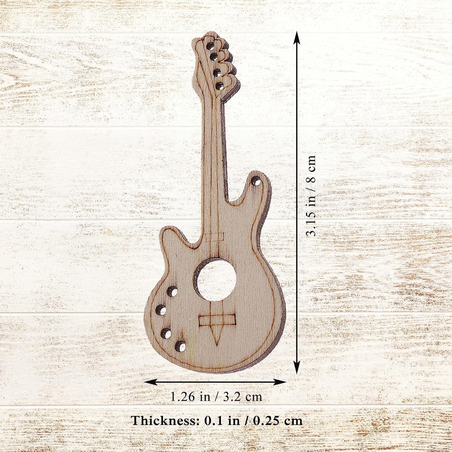 Wooden guitar-shaped cutout with dimensions on a light wood background